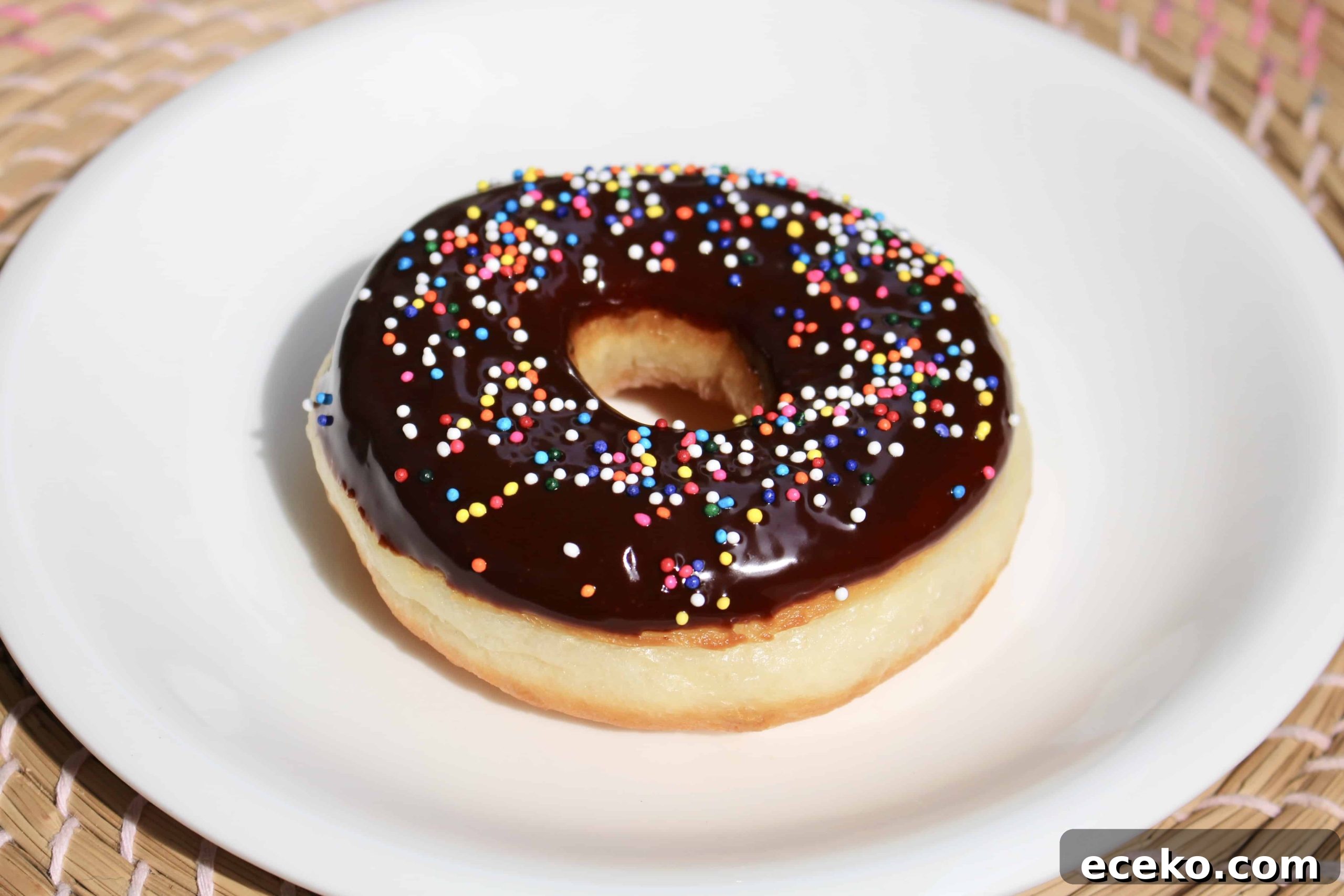 Homemade Doughnuts from a Bread Machine: Simple Recipe for Fluffy Treats 10 Did you know you can make fluffy and delicious yeasted doughnuts in a bread machine? These homemade doughnuts are going to knock your socks off! Glazed, dipped into chocolate, or covered in cinnamon sugar, do what you want! Go nuts with your doughnuts! #donuts #doughnuts #fluffy #homemade #yeasted #glazed #chocolate #sprinkles #doughnutholes #timbits #dunkindonuts #krispykreme #timhortons #breadmachines #fried