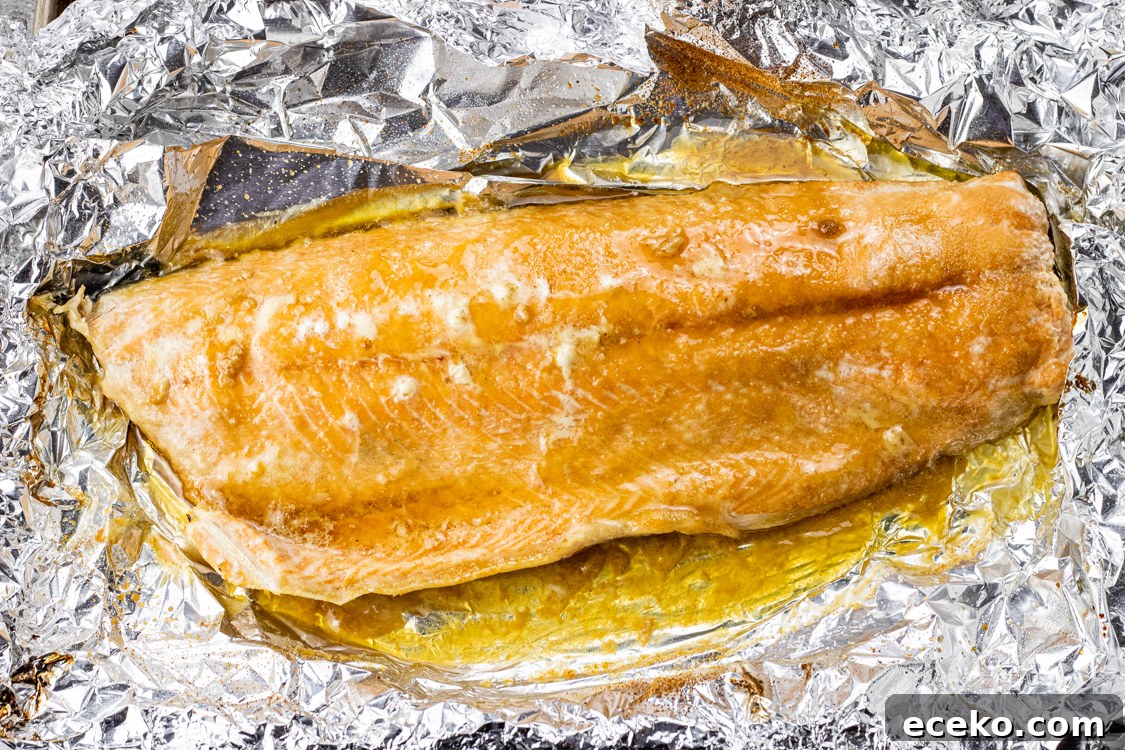 salmon on foil with melted butter and brown sugar