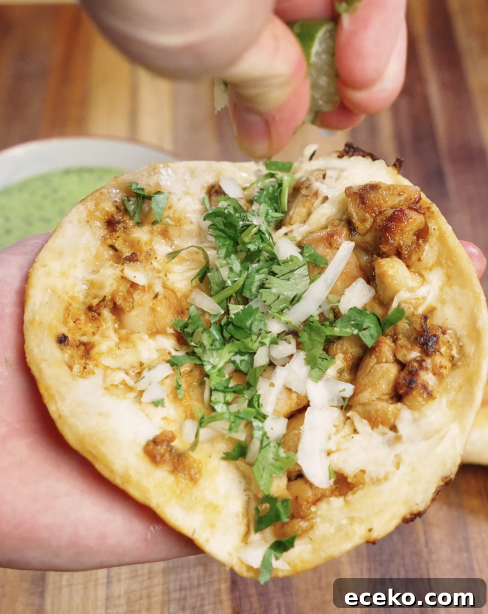 Crispy Chicken Tacos Recipe with Zesty Slaw and Lime крем 8 Fresh chopped cilantro and finely diced onion added on top of crispy chicken tacos, finished with a squeeze of lime for brightness and flavor.