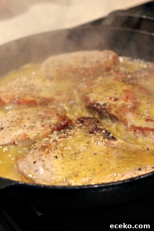 Garlic Butter Pork Chops in a Cast Iron Skillet Recipe 5 Garlic Butter Pork Chops Cooking in cast iron Skillet