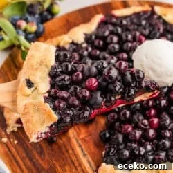 Blueberry Galette on plate topped with Vanilla Icecream