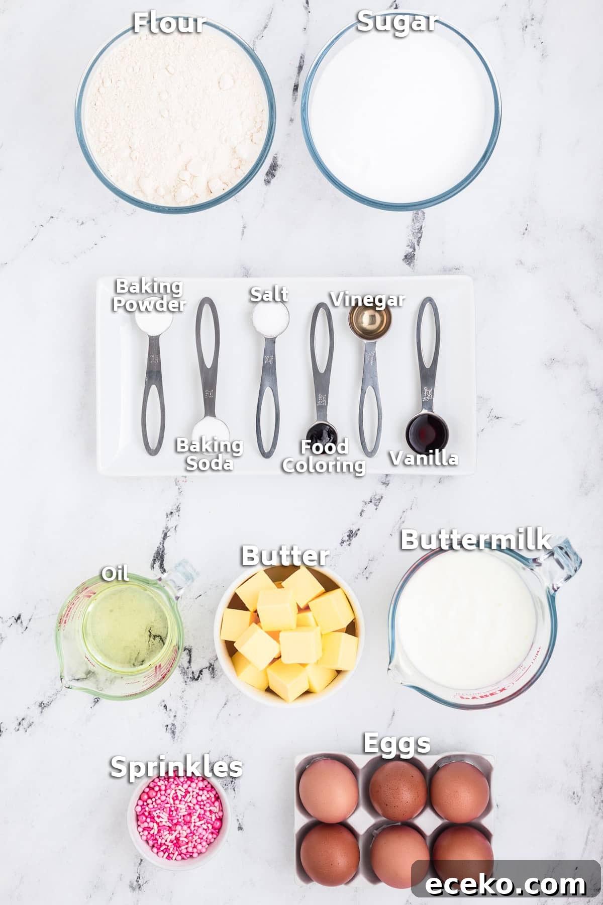 Bowls of ingredients including butter, oil, flour, sugar, eggs and sprinkles.