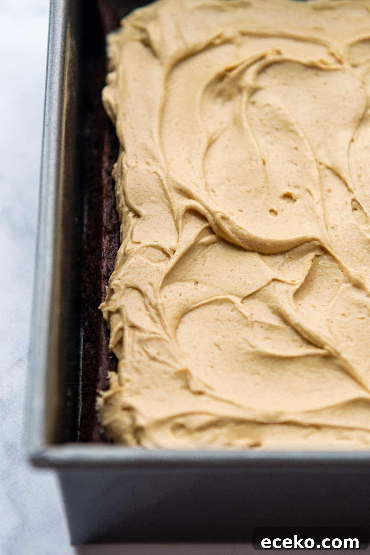 close up over peanut butter frosting on top of brownies