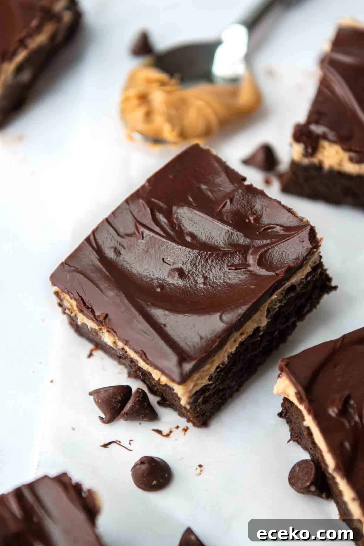 top of a brownie with shiny chocolate frosting