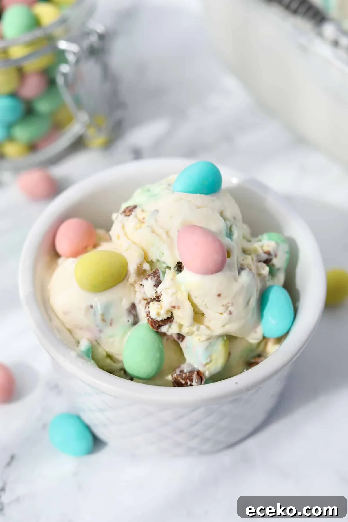 A bowl of mini egg ice cream topped with mini eggs.