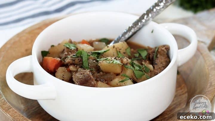 Slow Cooker Irish Lamb Stew Recipe 8 Irish stew garnished with salt, pepper, and fresh parsley.