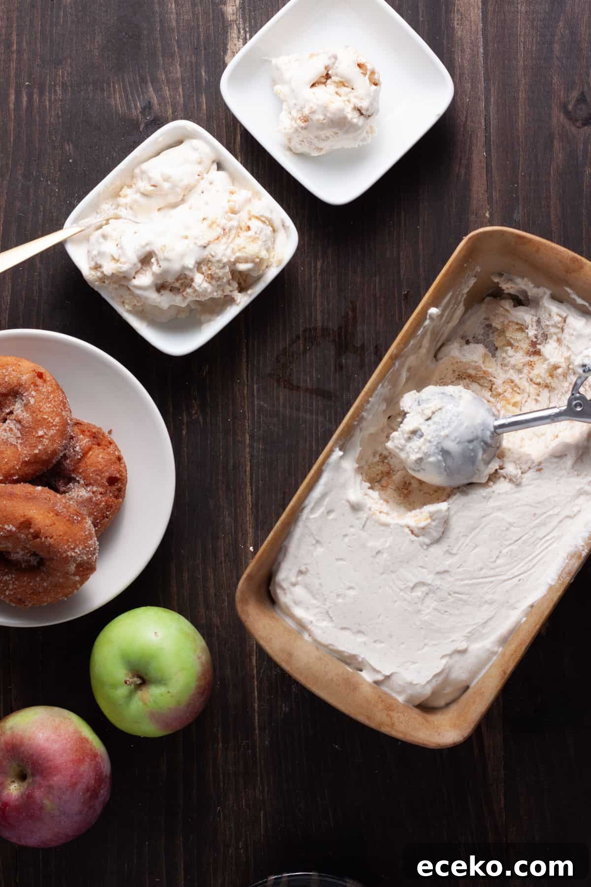 Cider Donut Ice Cream getting scooped out of a pan and served in small dishes.