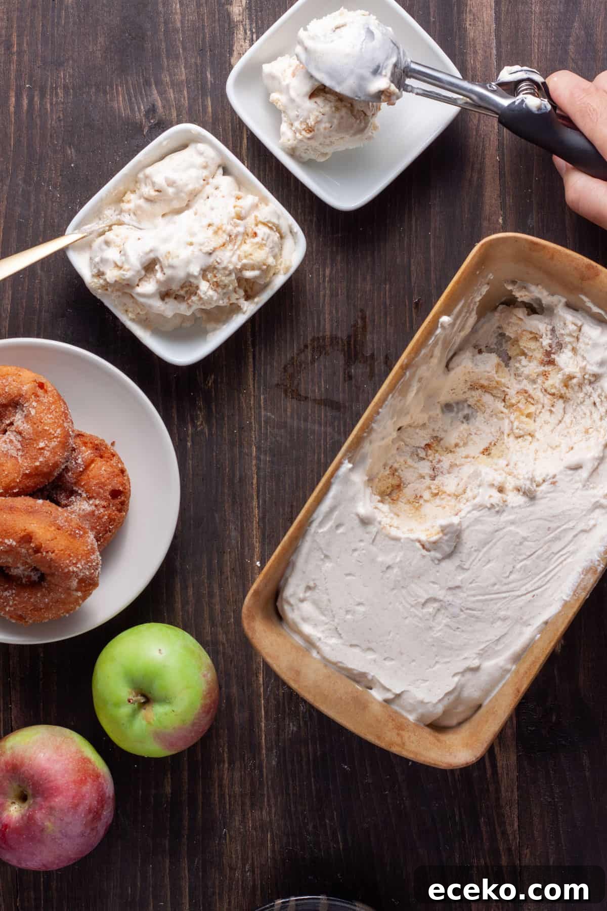 No-churn cider donut ice cream getting scooped into a small bowl.