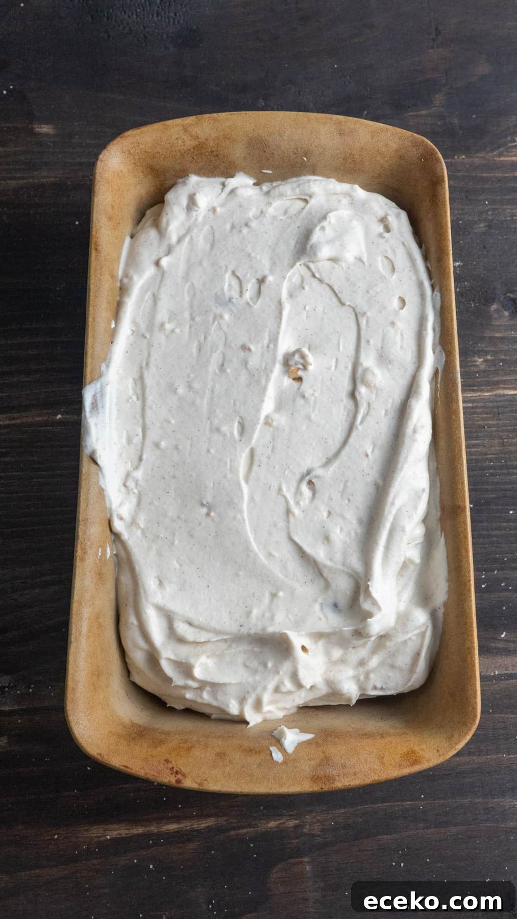 No-churn cider donut ice cream in a loaf pan ready to get frozen.