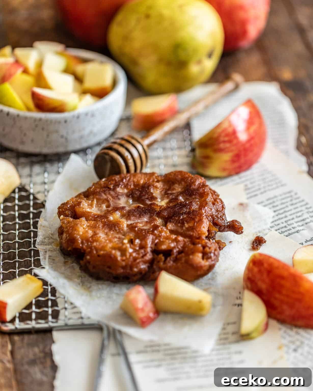 Photo of apple pear fritter on a piece of parchment paper