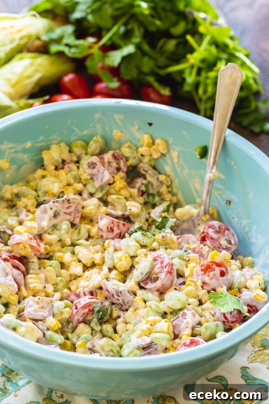 Grilled Corn and Butter Bean Salad in a large blue bowl