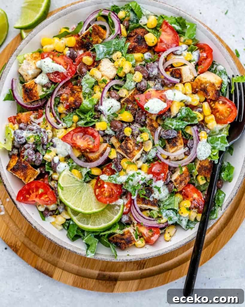 top view of chicken chopped salad in a white plate