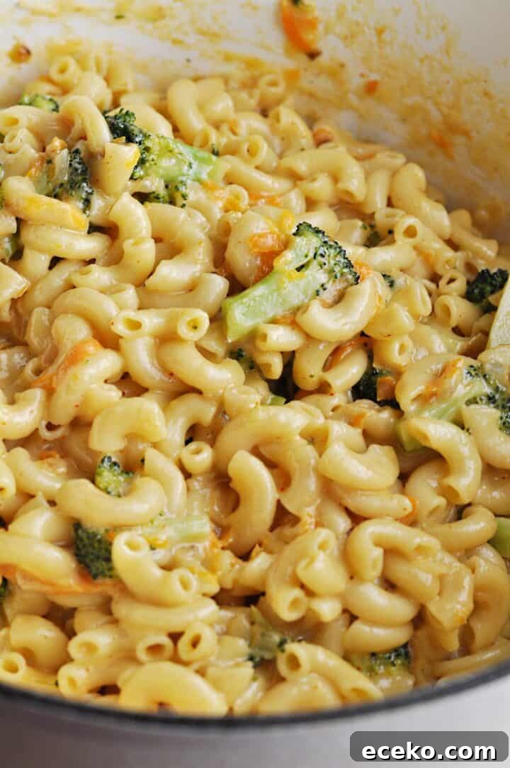 Making Macaroni and cheese with broccoli
