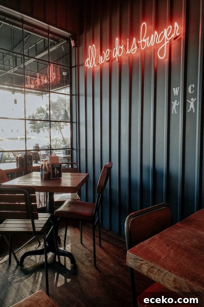 Dining Out on a Migraine-Friendly Diet: What to Order and Ask For 2 A photo of the inside of a restaurant with a sign for burgers in the background