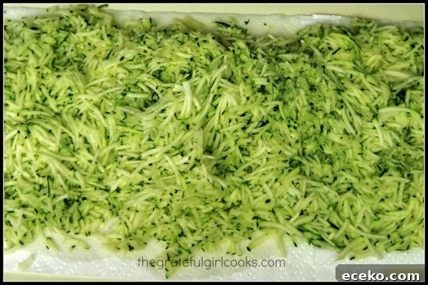 Grated zucchini in bowl