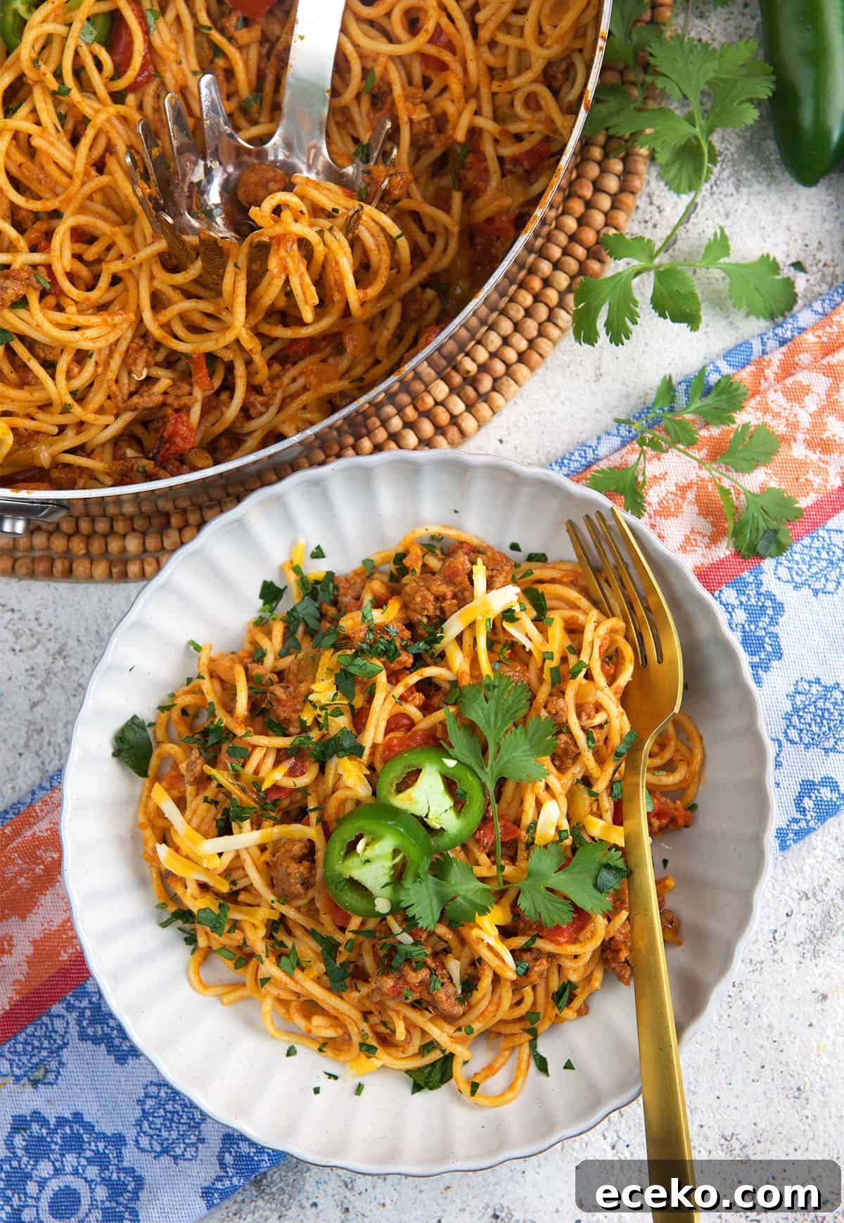 Taco Spaghetti Recipe: Spicy Mexican-Italian Fusion Pasta 5 Taco Spaghetti in a bowl with a fork.
