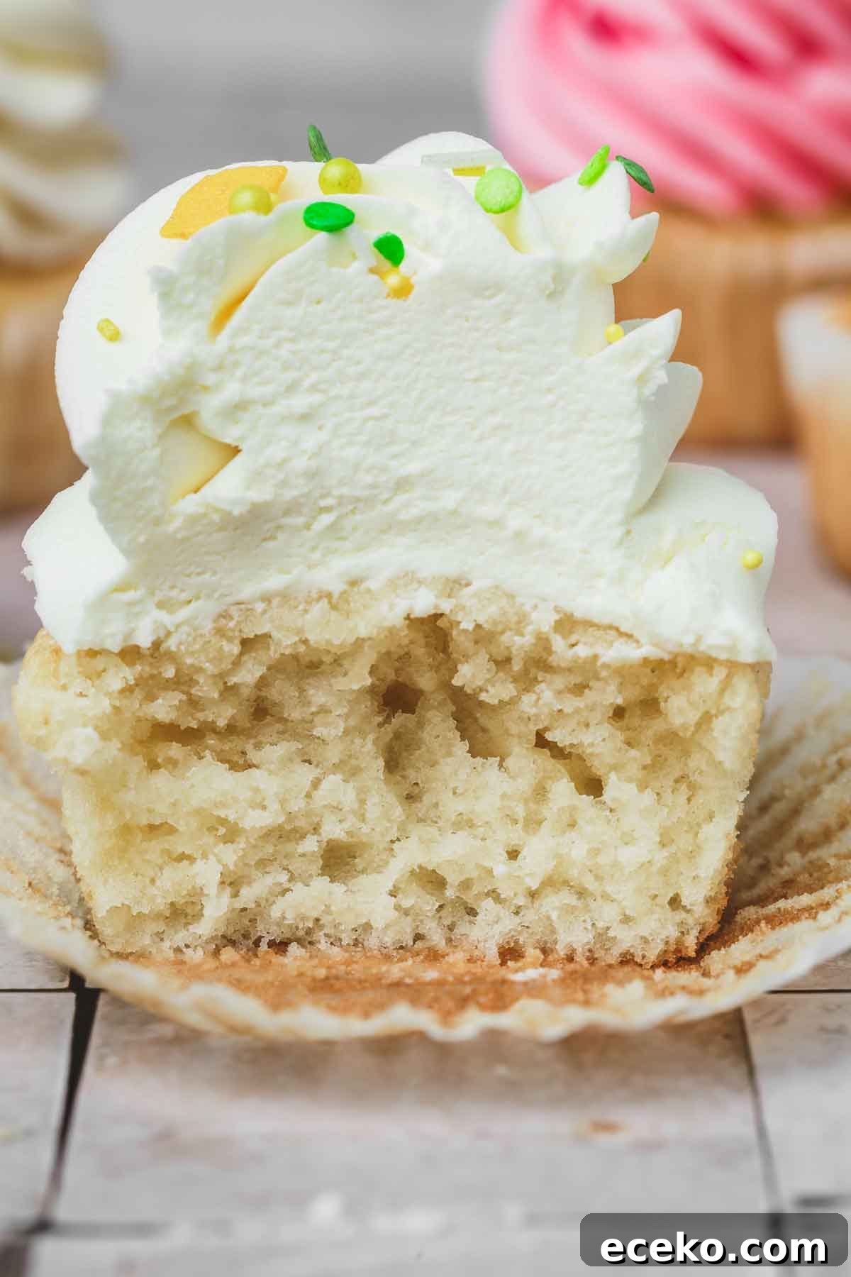 half vanilla cupcake made with oil on a table