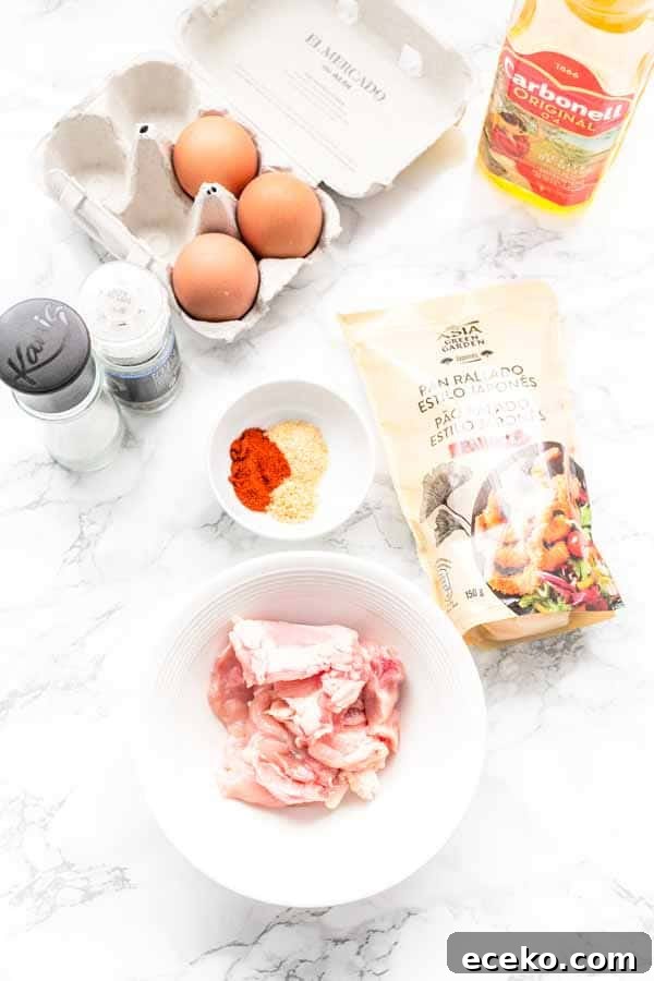 Make the best Air Fryer chicken nuggets with chicken thighs, seasoning and a little bit of oil to turn it into crispy nuggets. You can serve them as a snack, or with dinner.