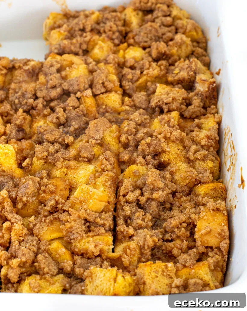 Eggnog casserole in a white baking pan.