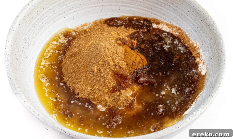 Streusel ingredients in a white speckled bowl.