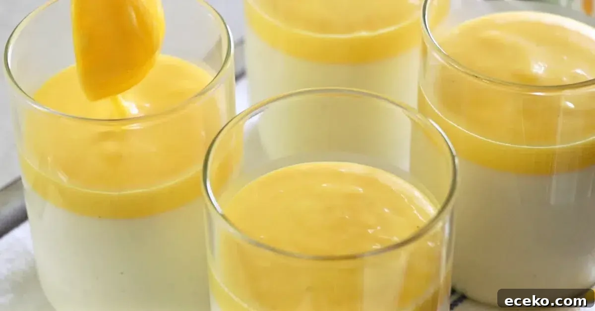pouring mango panna cotta base on vanilla panna cotta