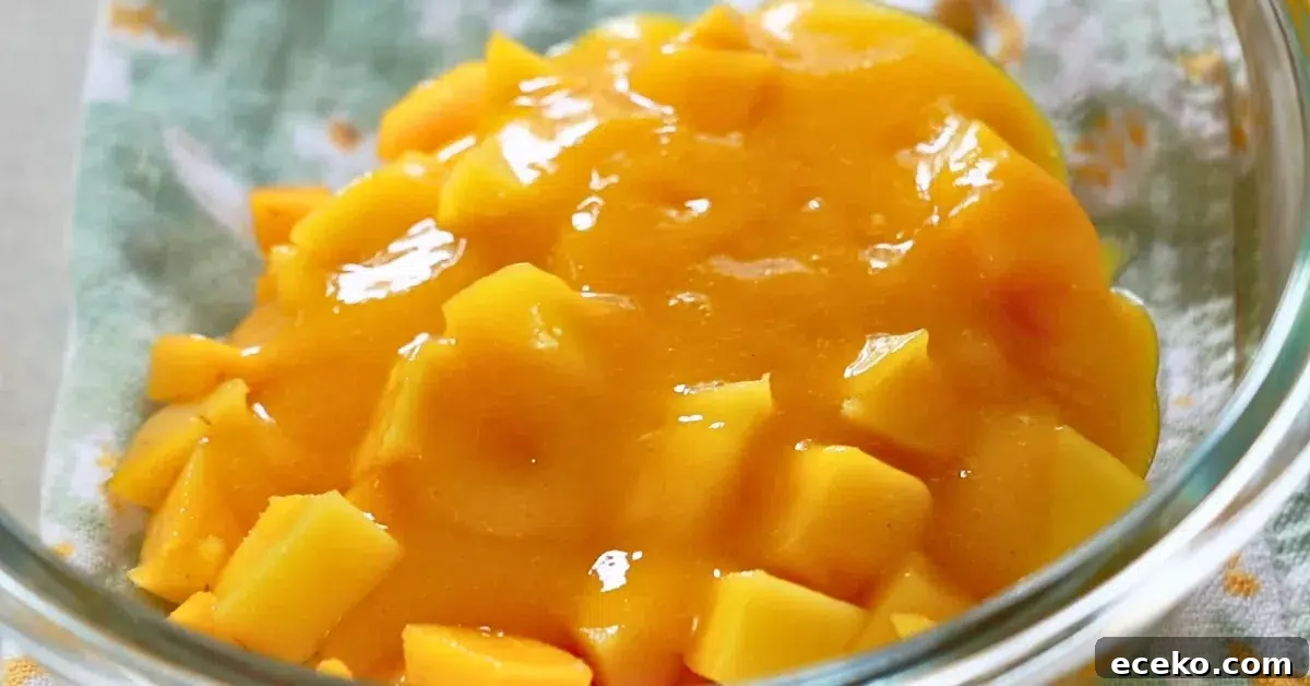fresh mango and pureed mango in a bowl