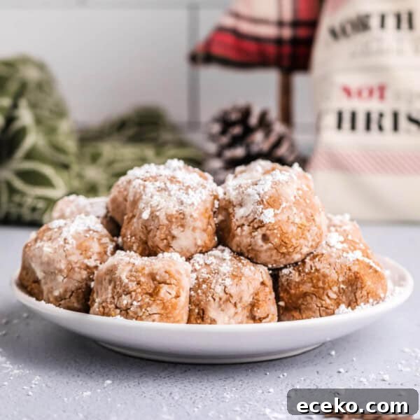 Mini No-Bake Chocolate Peanut Butter Cheesecakes 7 finished no bake peanut butter snowballs on plate