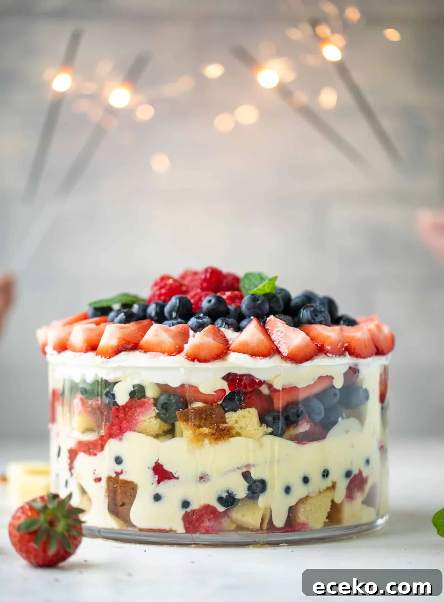 Triple-Berry Trifle with Fresh Raspberry Sauce 11 red white and blue berry trifle with raspberry sauce