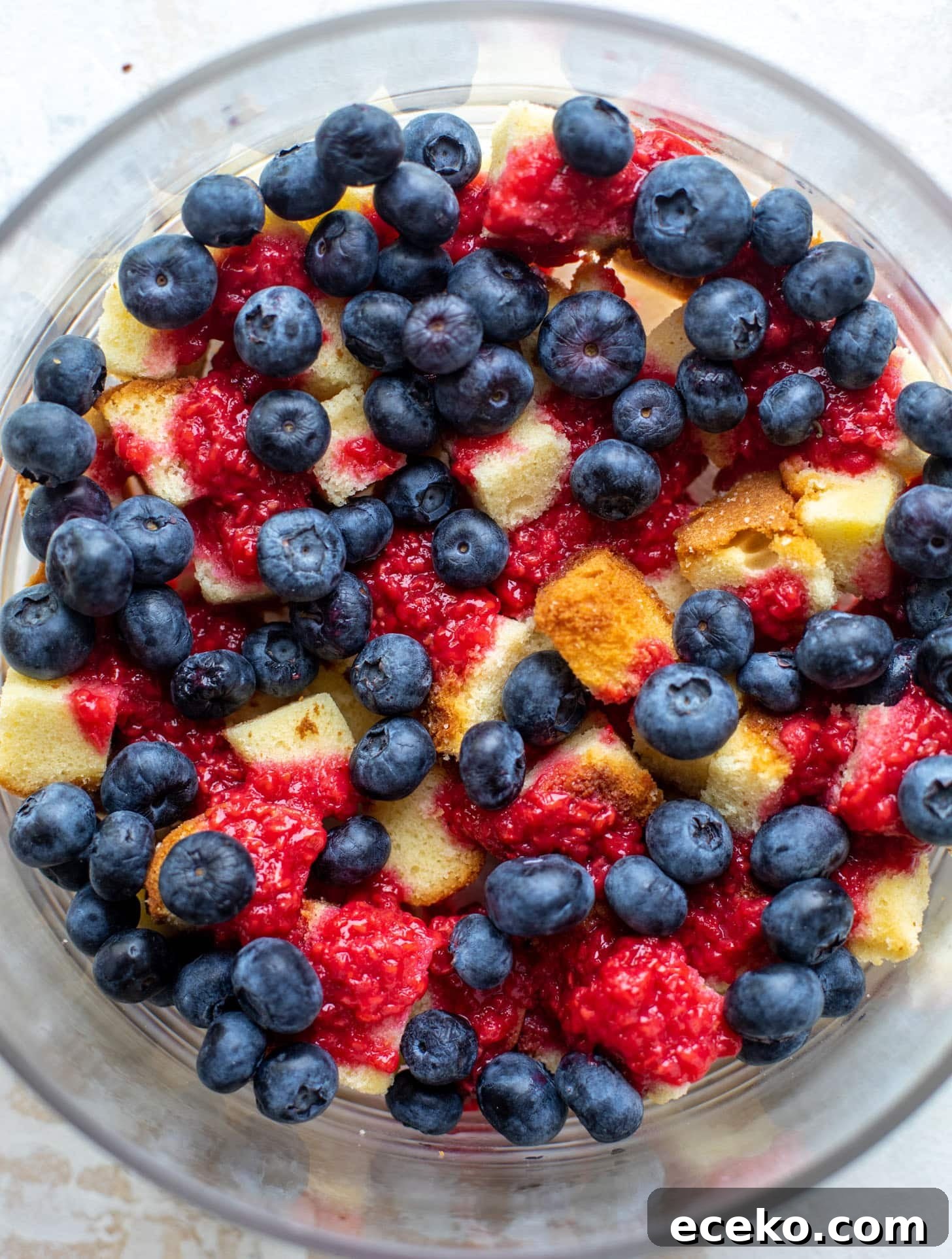 Triple-Berry Trifle with Fresh Raspberry Sauce 4 red white and blue berry trifle