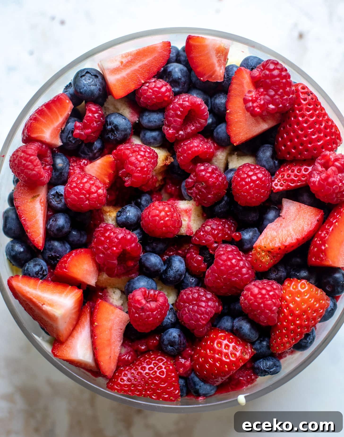 Triple-Berry Trifle with Fresh Raspberry Sauce 7 red white and blue berry trifle with raspberry sauce