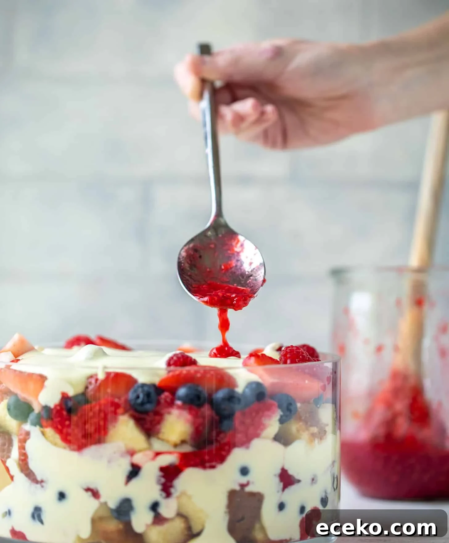 Triple-Berry Trifle with Fresh Raspberry Sauce 8 drizzle raspberry sauce on trifle