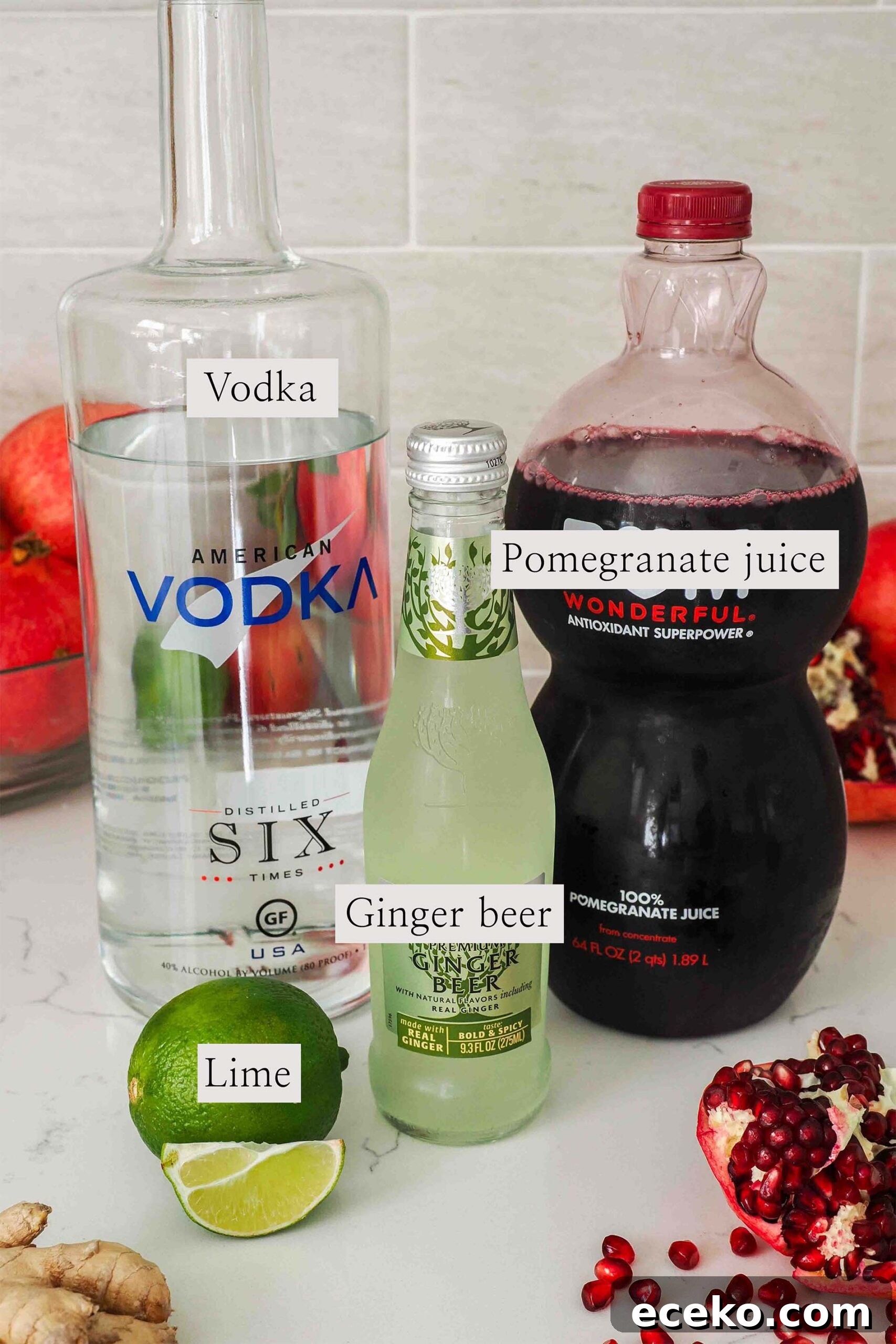 Ingredients needed to make a pomegranate Moscow mule.