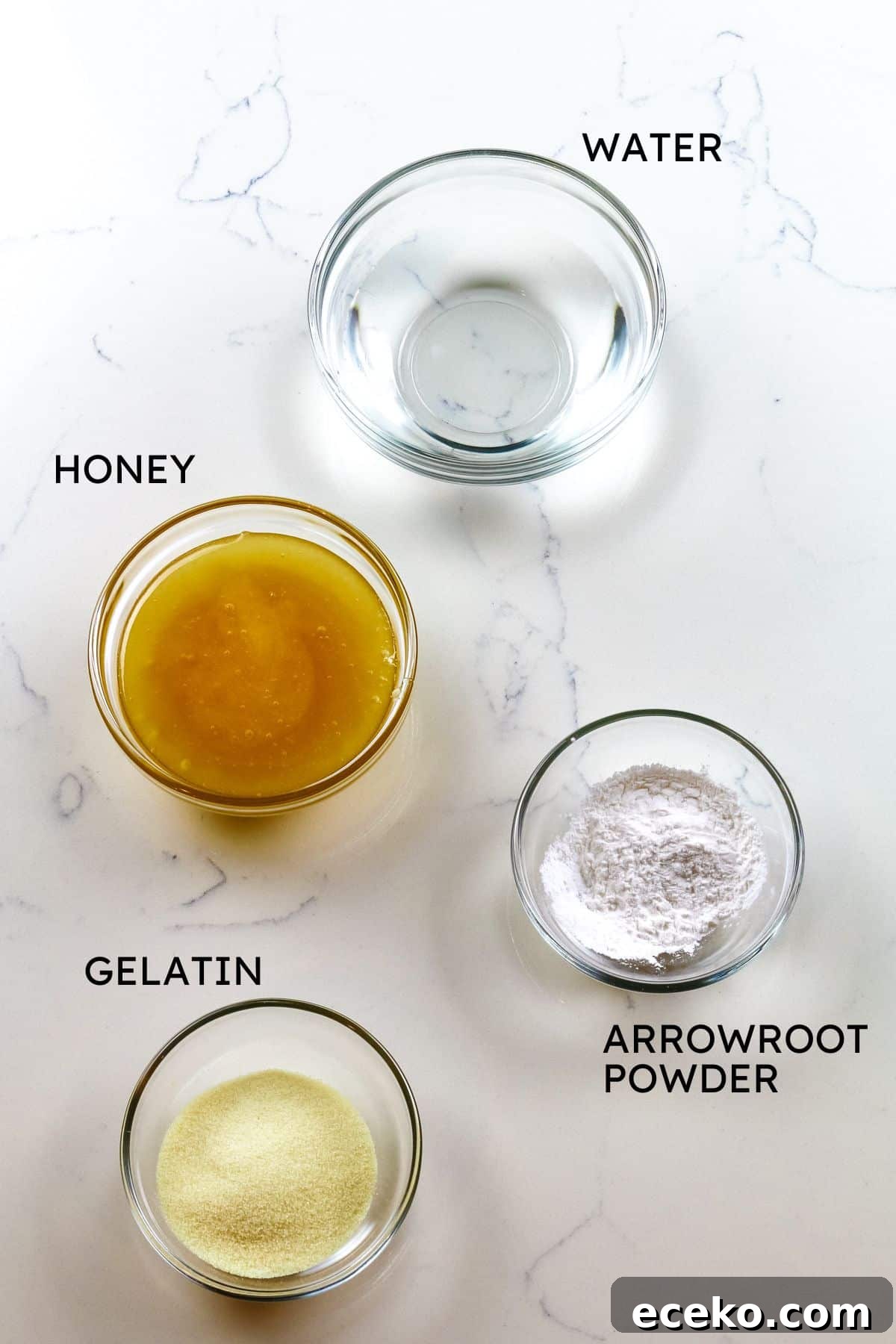 Homemade Marshmallows Without Corn Syrup — Simple Recipe 3 ingredients for homemade marshmallows, including water, honey, arrowroot powder, and gelatin.