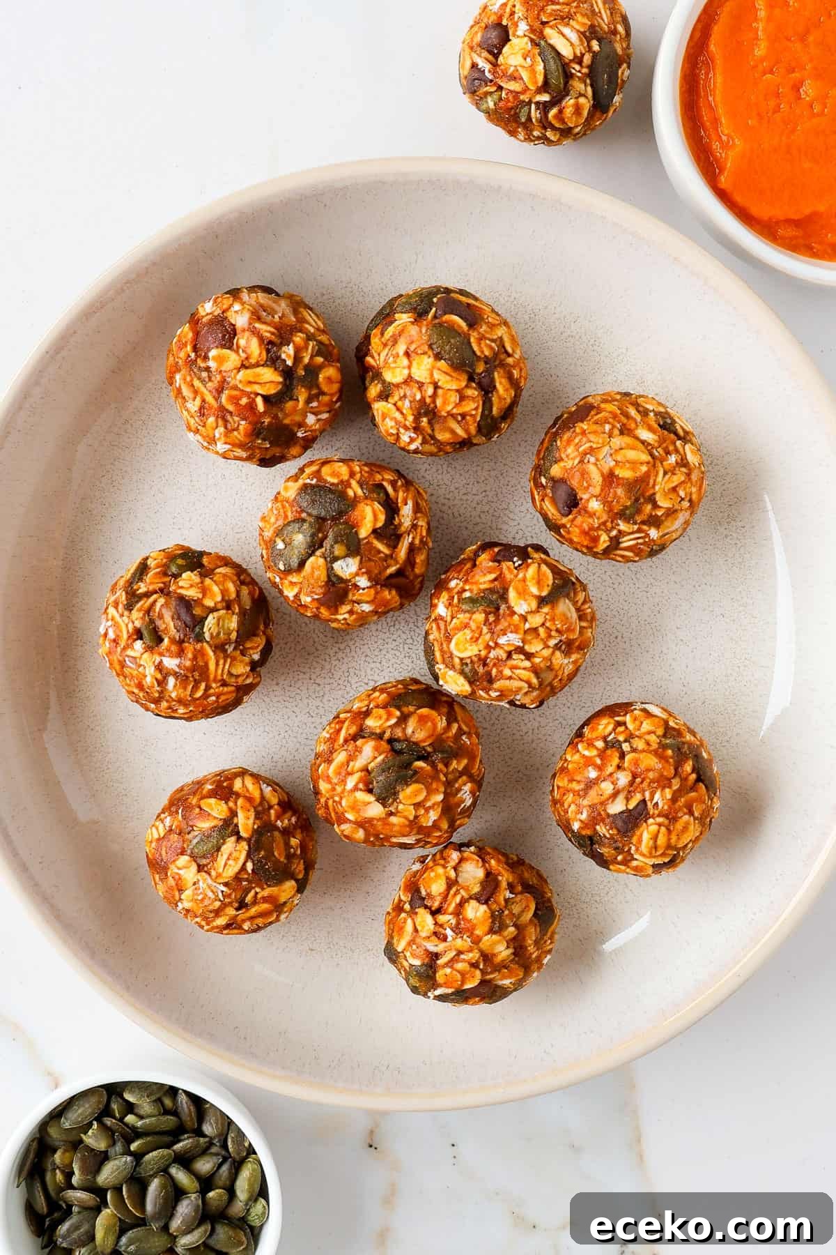 Pumpkin protein balls in a bowl.