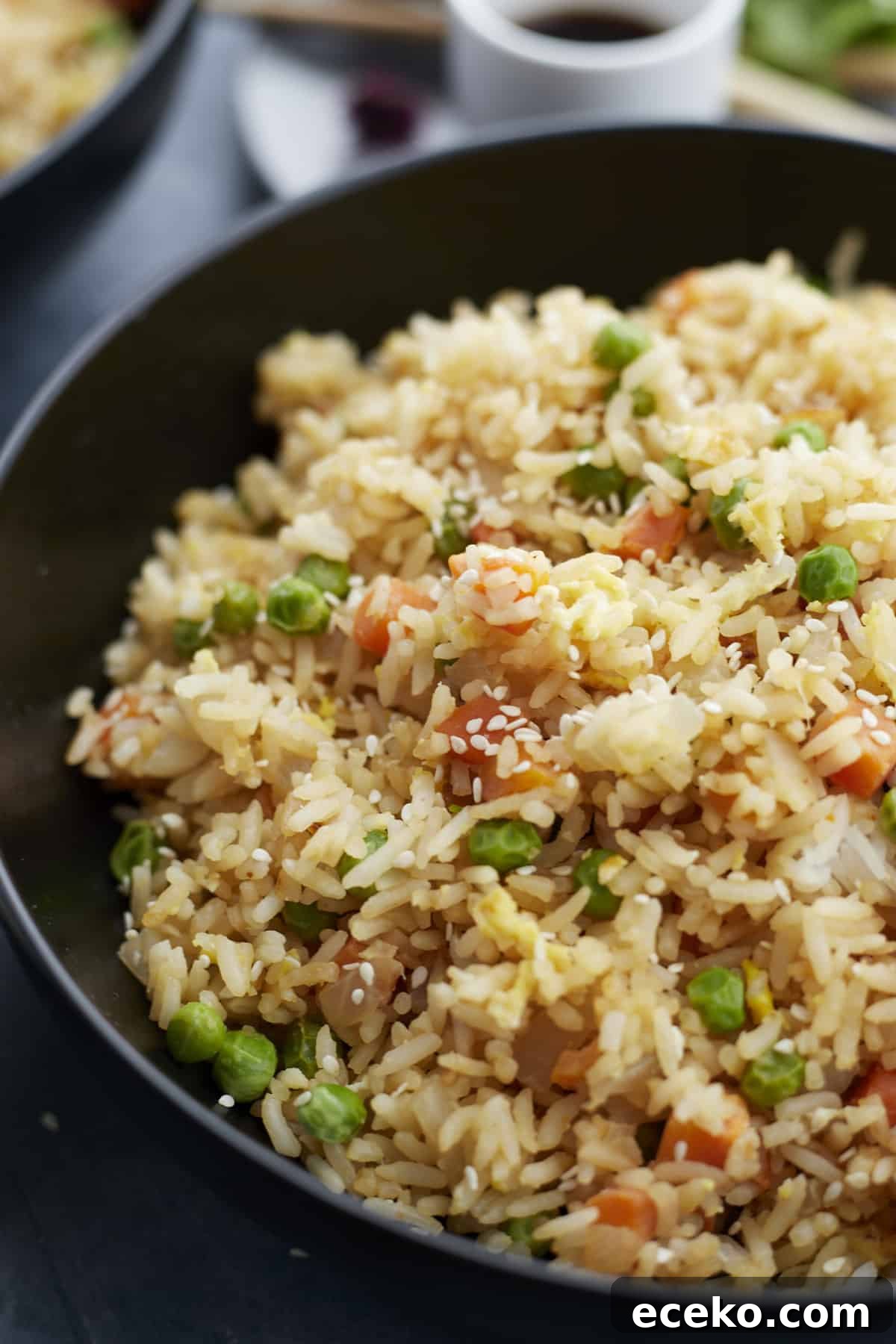 Fixing Gummy Rice: Simple Tips for Fluffy, Separated Grains 5 close up image of wok egg fried rice