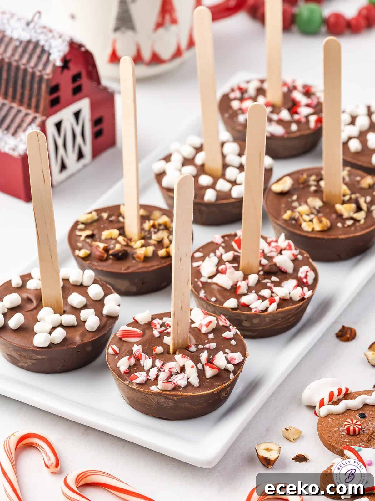 Made with semi-sweet chocolate, Nutella, and heavy cream, Hot Chocolate on a Stick is a fun way to enjoy a rich, indulgent mug of hot cocoa. Hot chocolate sticks on a serving tray