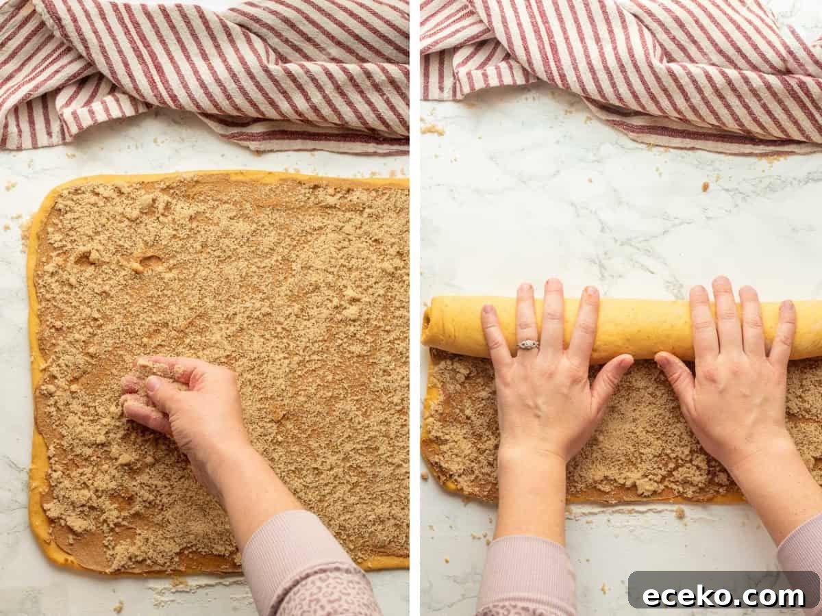 Sprinkling brown sugar over pumpkin dough and rolling up filling inside dough.