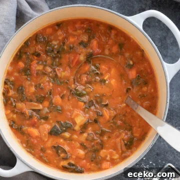 Ribollita in a gray pot.