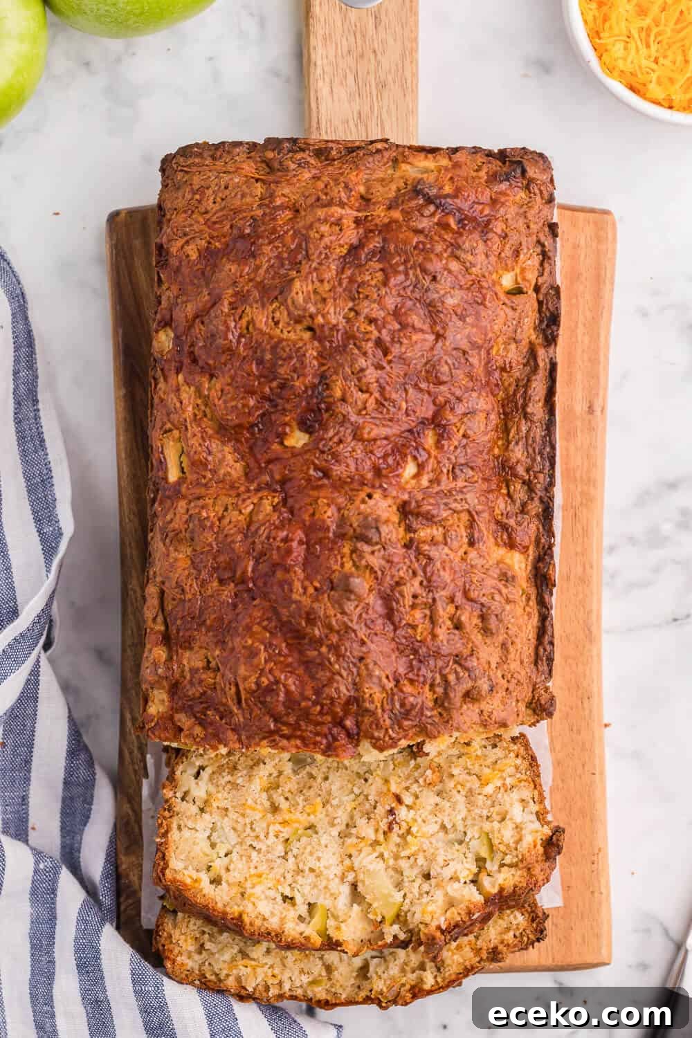 Apple cheddar bread with slices cut on the end