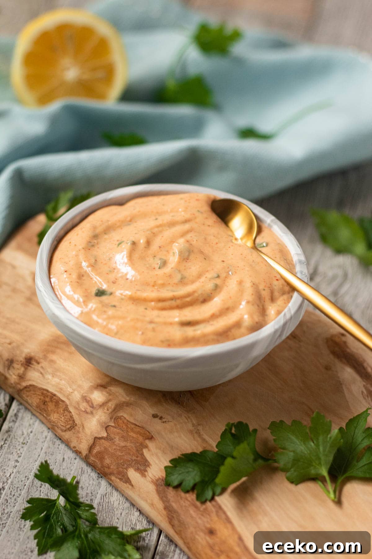 Authentic New Orleans Remoulade Sauce Recipe for Seafood 3 side shot ofNew Orleans remoulade sauce in a gray bowl.