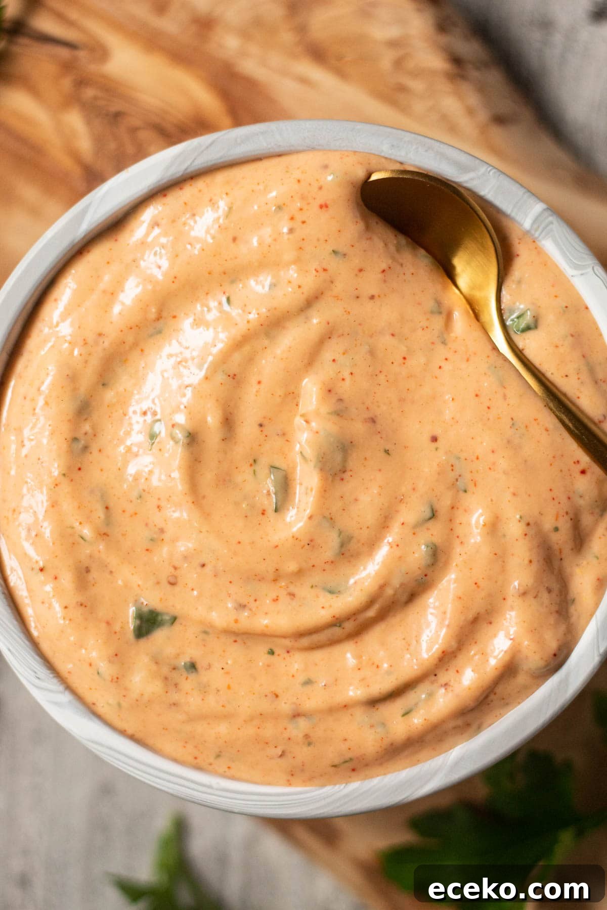 Authentic New Orleans Remoulade Sauce Recipe for Seafood 7 New Orleans remoulade sauce in a gray bowl.