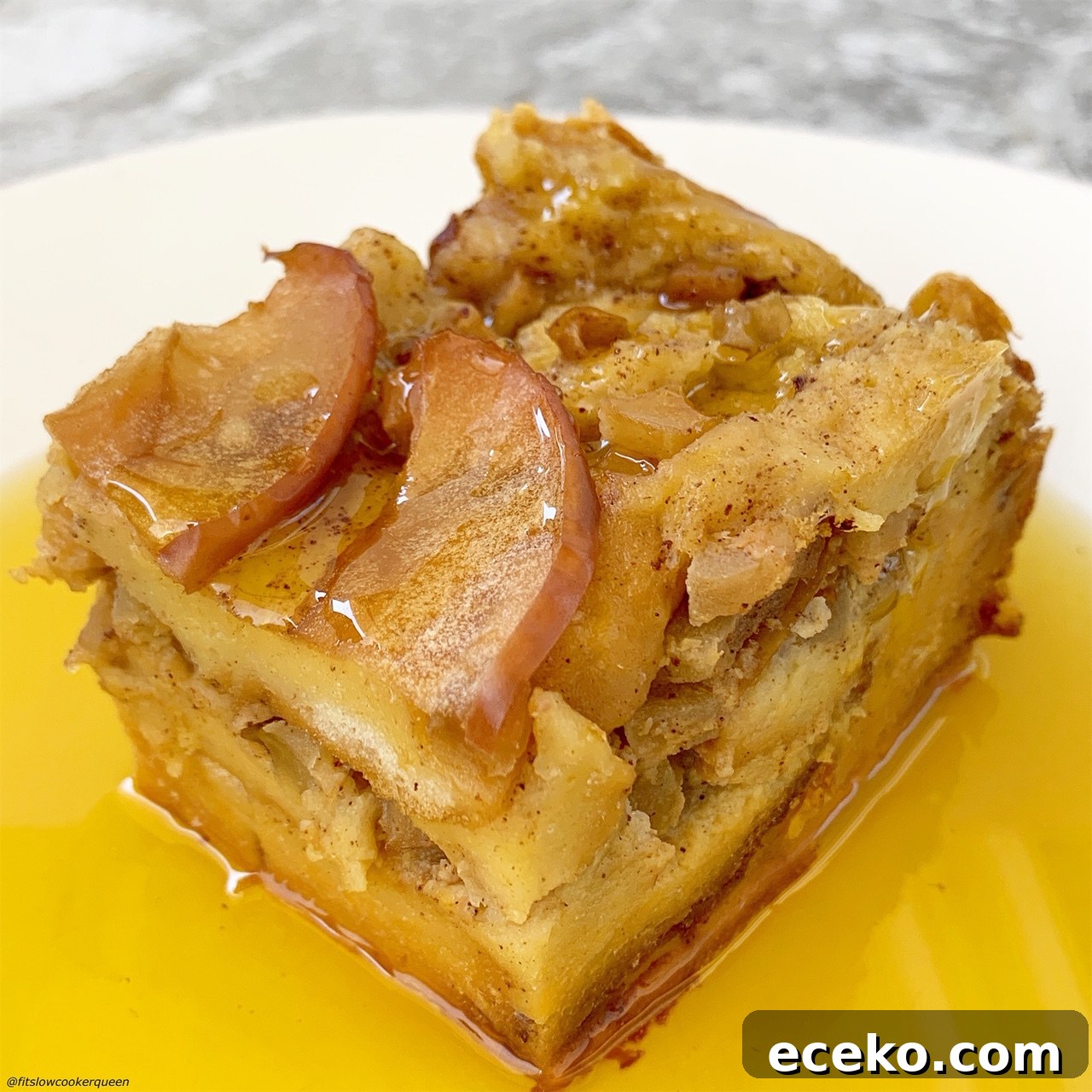 plated apples & honey challah bread pudding on top of honey 