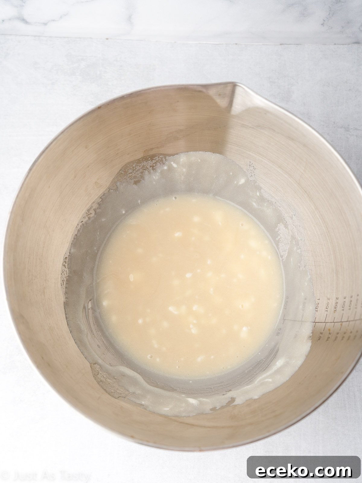 Wet ingredients in a mixing bowl.