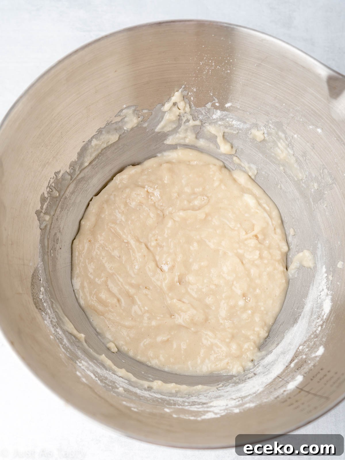 Tres leches cake batter in a mixing bowl.
