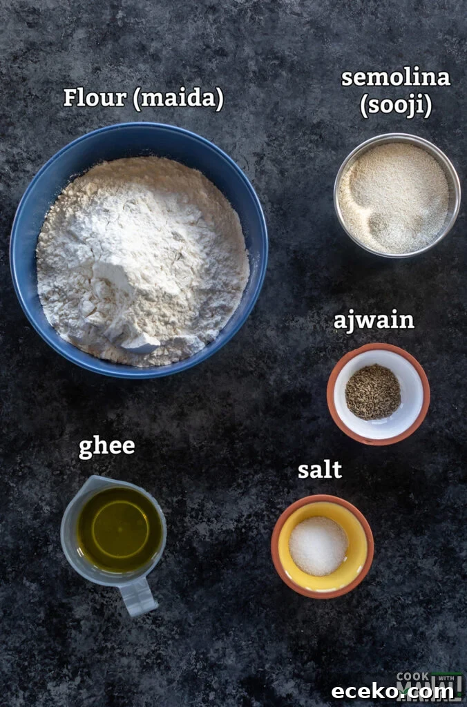 ingredients for making namak para arranged on a board