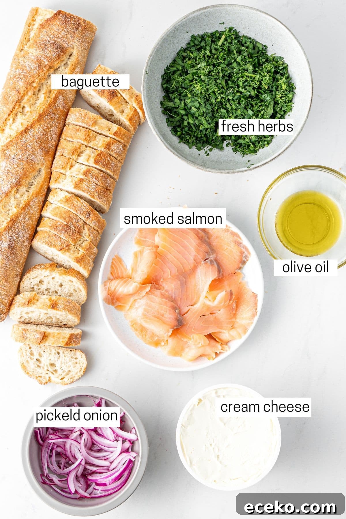 Smoked Salmon Crostini Recipe with Dill Cream Cheese & Capers 4 All ingredients needed for smoked salmon crostini laid out in bowls.