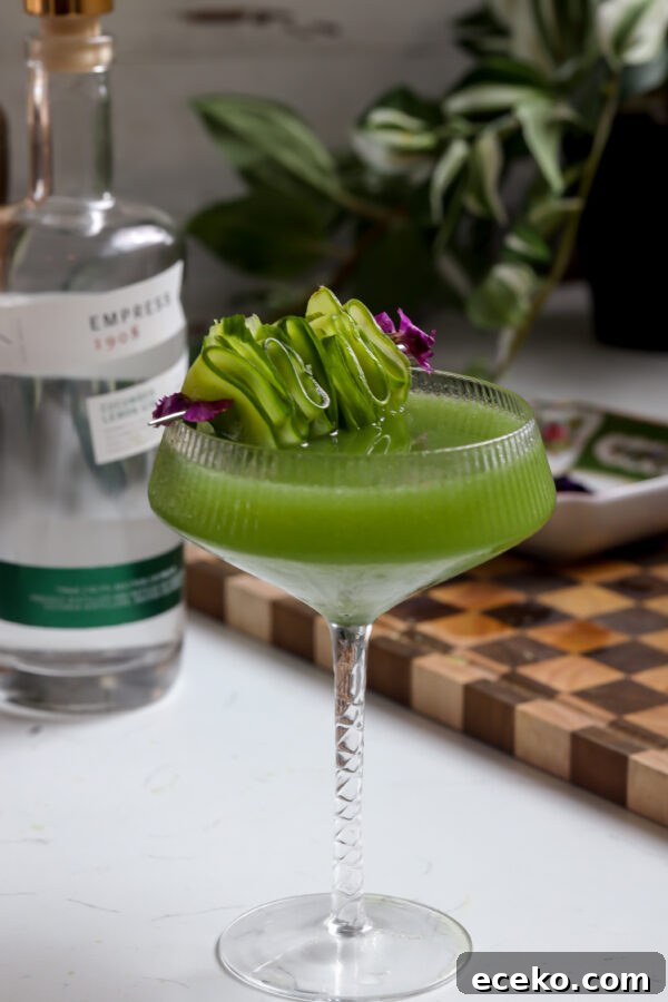 Spicy Tuna Oshizushi: Pressed Sushi Recipe 5 Cucumber martini made gin but you can make it with vodka, garnished with edible flowers and sliced cucumber.