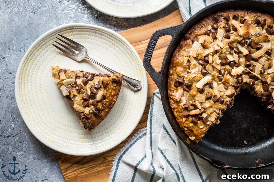 Skillet Banana Bread with Coconut and Chocolate Chips 5 A plate with a slice of coconut chocolate chip banana bread