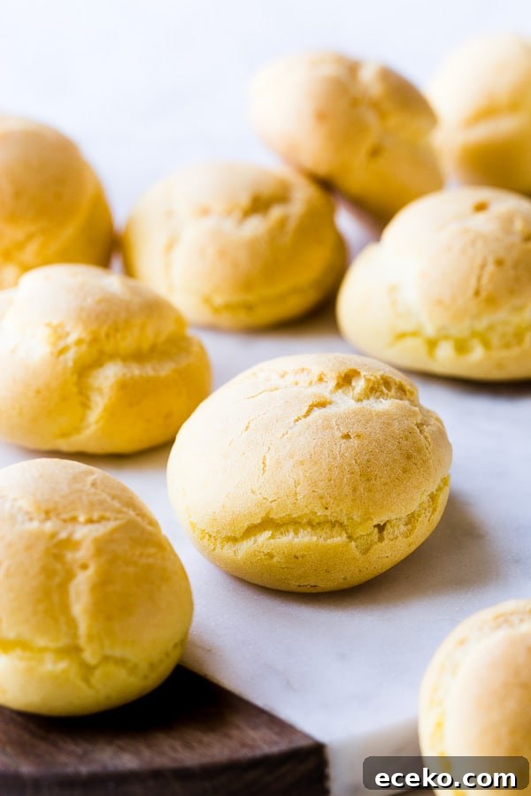 Raspberry Crème Puffs with Vanilla Cream Filling 5 Hollow choux pastry shells ready for filling.