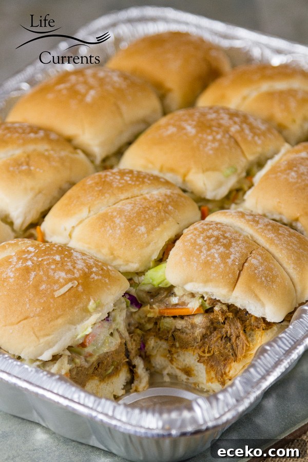 These Pulled Pork Sliders with Ranch Coleslaw will be a hit at your next picnic, pool party, or summer gathering. These Pulled Pork Sliders with Ranch Coleslaw will be a hit at your next picnic, pool party, or summer gathering.